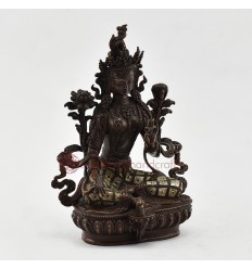 Hand Carved Green Tara Statue in Oxidation and and Decorated with Silver Plates